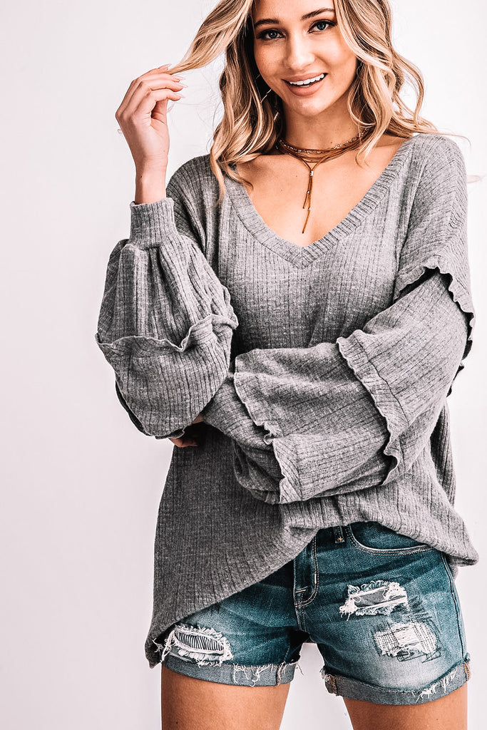 Tell Me About it Top