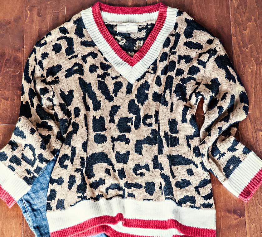 SWEATERS